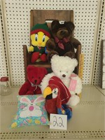 Wood chair and stuffed animals.