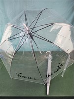 Two clear umbrellas Love is in the air