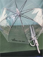 Three clear umbrellas Love is in the air