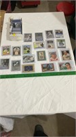 Baseball collector cards in plastic sleeve.