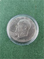 Bicentennial Eisenhower dollar coin in coin case