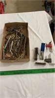 Allen wrenches, various drill bits.