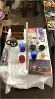 Glass cups, metal pitcher, car picture, music box