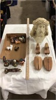 Jesus head statue, wood shoe stretchers,