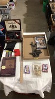 Mouse traps, playing cards, book, nascar cards