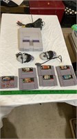 Super Nintendo system with controllers (