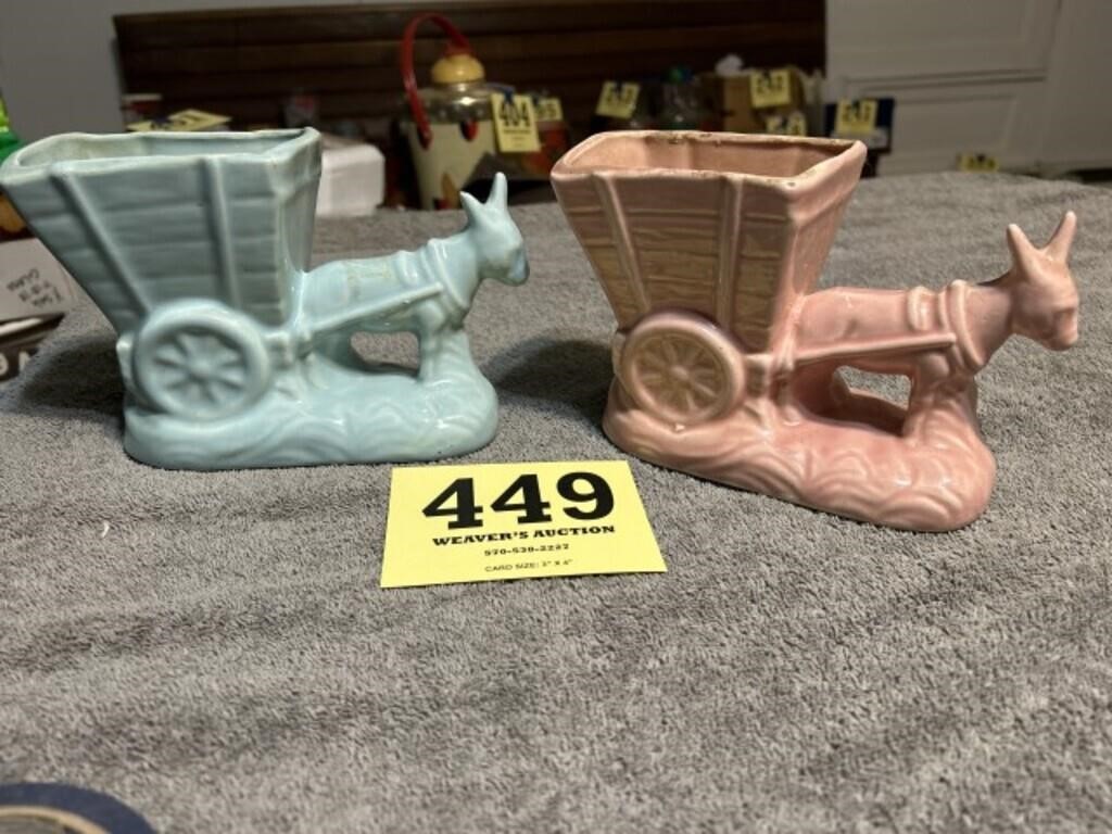 Two vintage pastel, pink and blue donkey cart