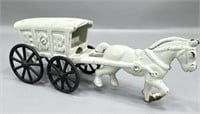 Original cast-iron ice wagon with horse