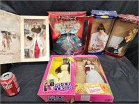5 Barbie dolls and 1 fashion doll.  Look at the