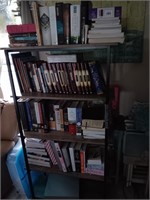 Nice Shelf and all the books lot of religious.
