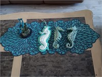 Box of seahorse ornaments, table runner and more.