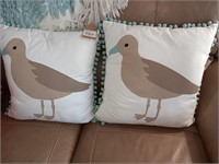 Pair of decorator pillows with birds.