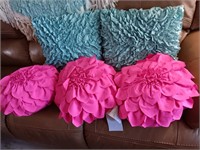 5 decorator pillows, blue teal and pink.