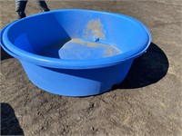 large blue poly water trough