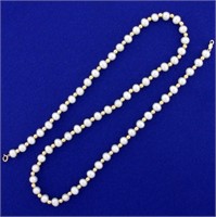 18 Inch Cultured Pearl and Gold Bead Necklace in 1