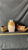 Wicker baskets, decor, and long branch mug