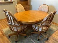 Oak dining Table with 4 Roller Chairs