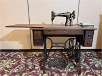 Singer Sewing Machine in Cabinet w/ Notions
