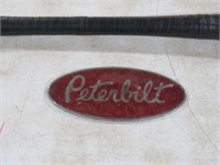 VINTAGE METAL PETERBILT EMBLEM & TIRE THUMPER