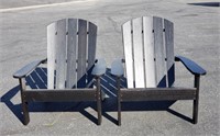 Pair of black wood Adirondack chairs