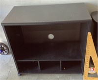 Small entertainment cabinet on wheels