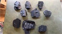 Group of 9 molded holster for a Glock 9mm