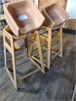 Two wooden high chairs and two booster seats u