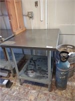 Stainless steel table with number 10 can opener