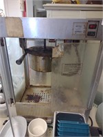 Older popcorn machine, dirty and needs cleaned