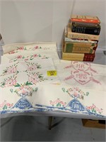 4 SETS OF NEEDLEPOINT PILLOWCASES, STACK OF BOOKS