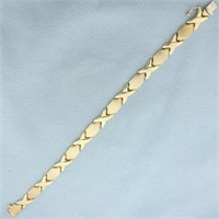 Italian X's and O's Bracelet in 14k Yellow Gold