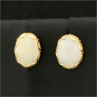 Oval Opal Stud Earrings in 14k Yellow Gold