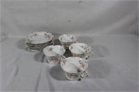 6 Theadore Haviland Limoges Saucers, and 4 Teacups