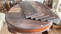 Antique dining table with 6 leaves, lovely design