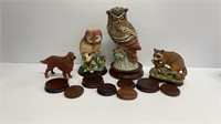 (2) owl figurines, raccoon and dog figurine: some
