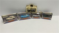 (4) matchbox Dinky die cast collectible cars and