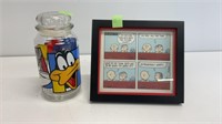 Looney tunes jar and a framed peanuts comic