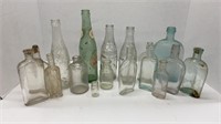 Vintage bottles, some apothecary, some soda watet