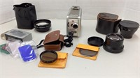 Camera lenses, meter, filter and Brownie