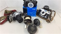 Canon, Minolta and Argus cameras, 3 fishing