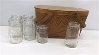 Woven picnic basket with (6) jars, 5 of them are
