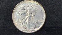 1942 Silver Walking Liberty Half Dollar higher