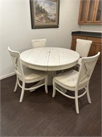 White round table and 4 chairs
