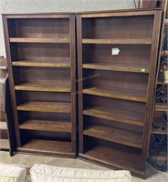 Two Bookshelf Cases with 6 shelves that are