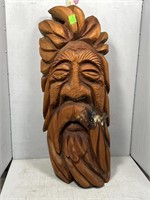 Wood carving of a man’s face - approx 12” x 27”