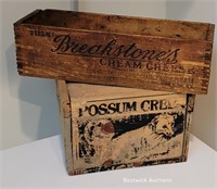2 small wooden advertising boxes