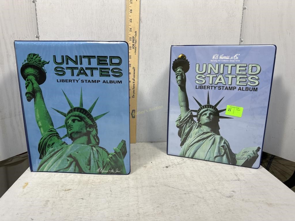 Two United States Liberty Stamp Albums Partially