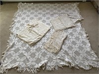 Lacy/crocheted coverlet/tablecloths