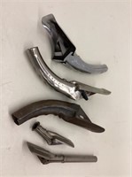 Collection of five oil can spouts