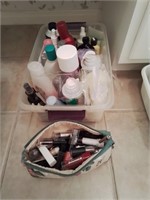 1 box of misc bathroom supplies and makeup bag.